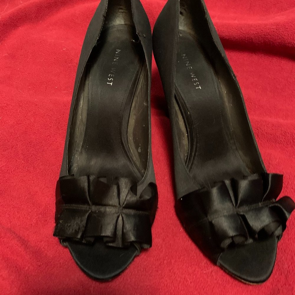 Nine West black satin peep toe pumps with bows